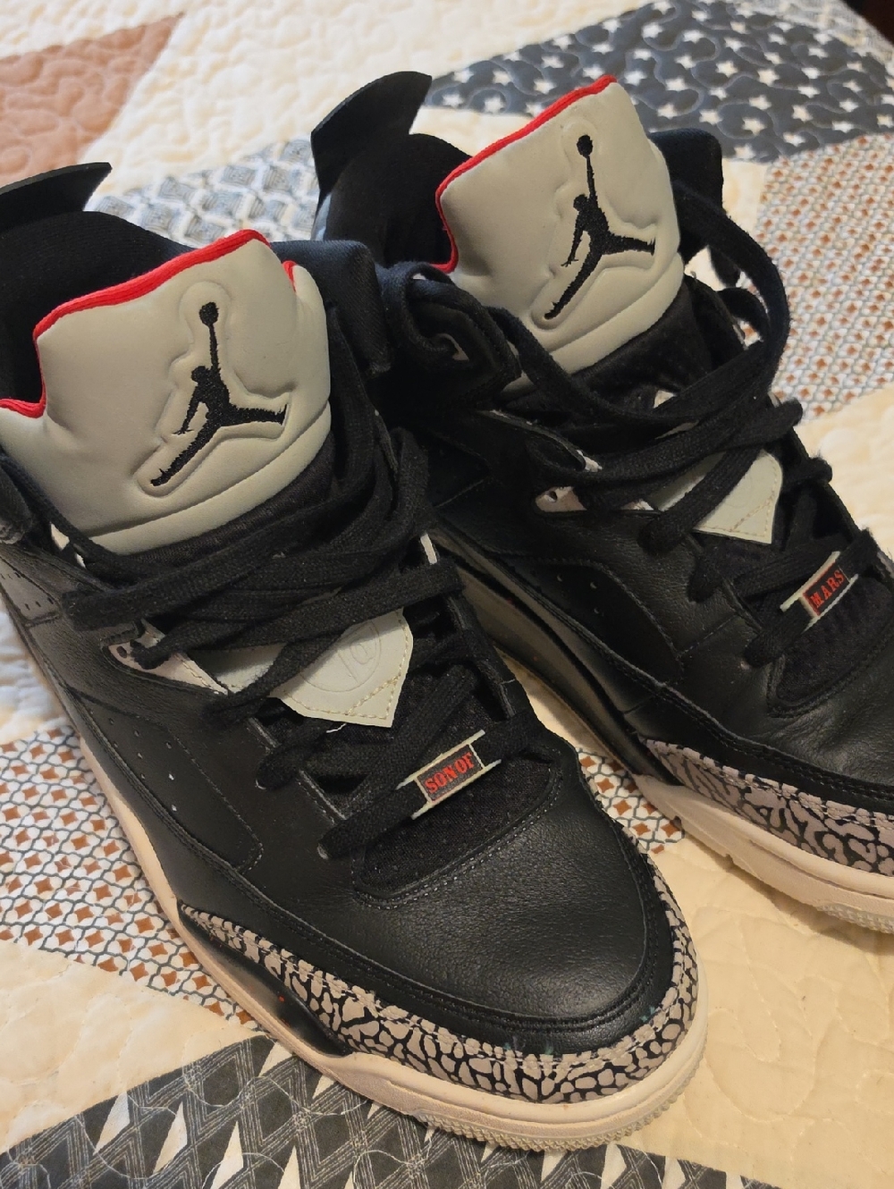 Nike Black and Grey High-Top Basketball Sneakers with Red Trim